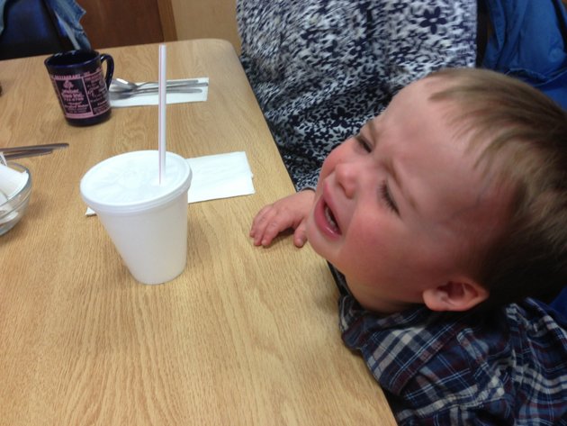Grandma wouldn’t let him spill his ice water all over her and the table.